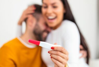 couple with hCG based positive pregnancy test pregnant beta-hCG